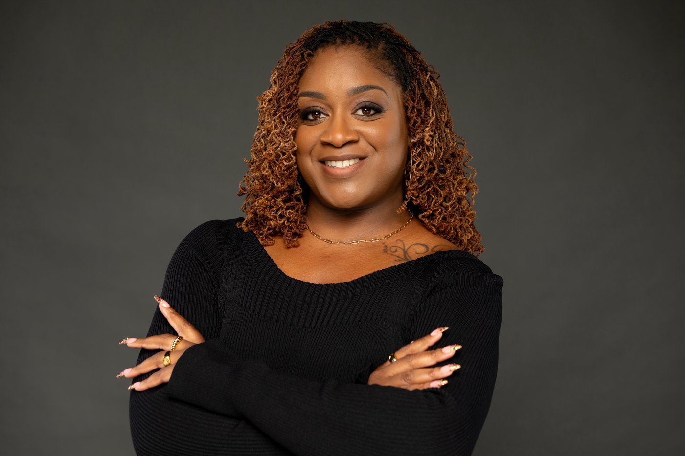 Portrait of Margina, J.D., Ed.S., founder of the Youth Justice Education Project